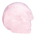 Edelstein-Totenkopf aus Rosenquarz, klein, seitliche Ansicht